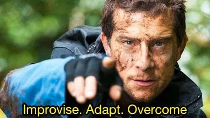 Bear Grylls crouched outdoors with the caption “Improvise. Adapt. Overcome.”
